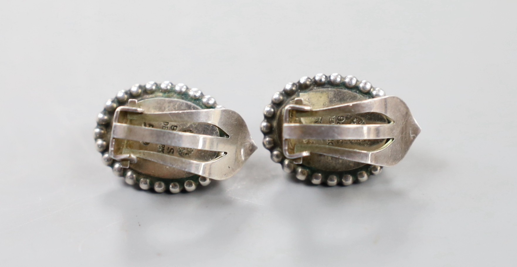 A pair of Georg Jensen sterling and lapis lazuli set oval ear clips, design no. 59, 15mm.